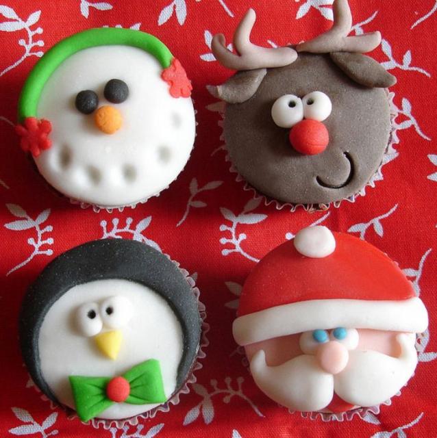 Christmas theme cupcakes in Snowman_ Reindeer_ Penguin and Santa face